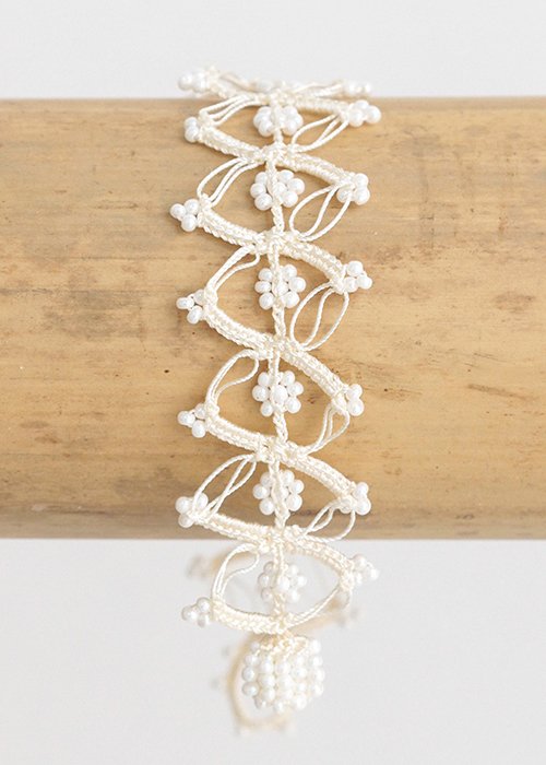 Armbnd Carland creme/white